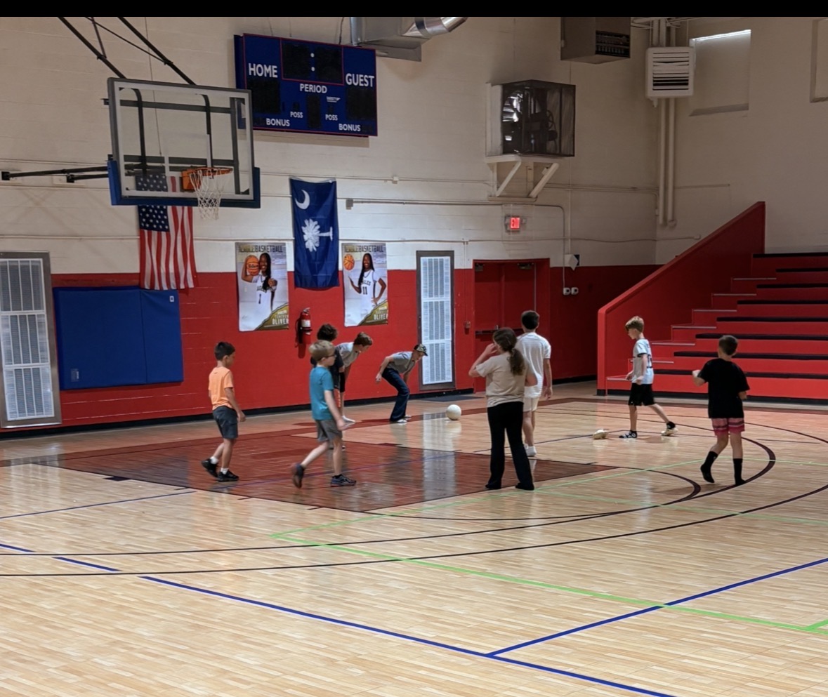 Children playing together in the gym